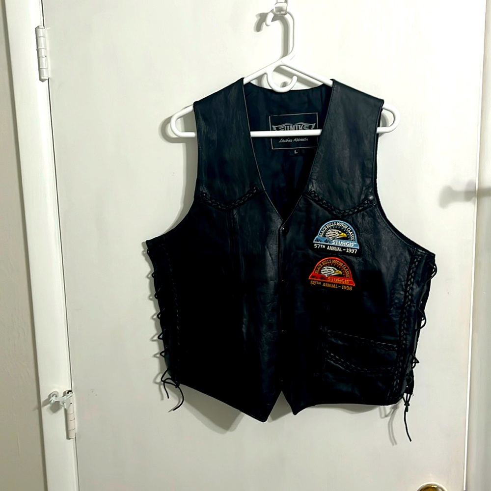Vintage Unik leather vest with patches and two front pockets